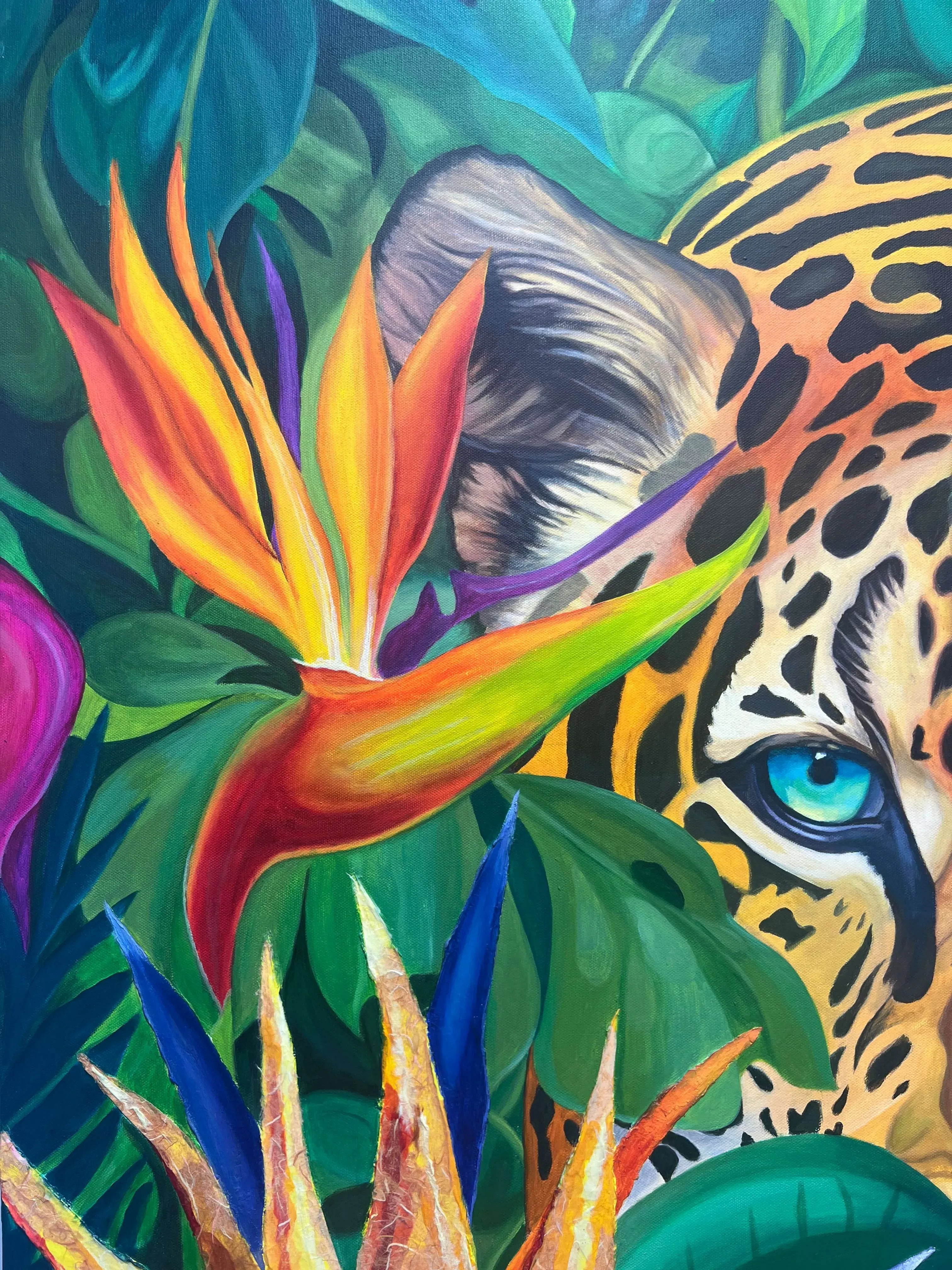 Jaguar eye and tropical Bird of Paradise flower detail in Wild Essence
